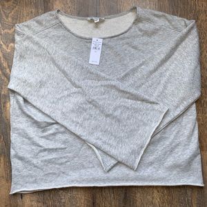 Grey American Eagle long sleeve flared arm shirt.